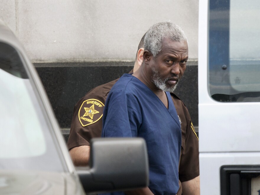 Mohammad Saaili Shibin, a Somali man accused of acting as chief negotiator for pirates who killed four American hostages, is transported from the U.S. District Court in Norfolk, Va., after a hearing on April 13, 2011.