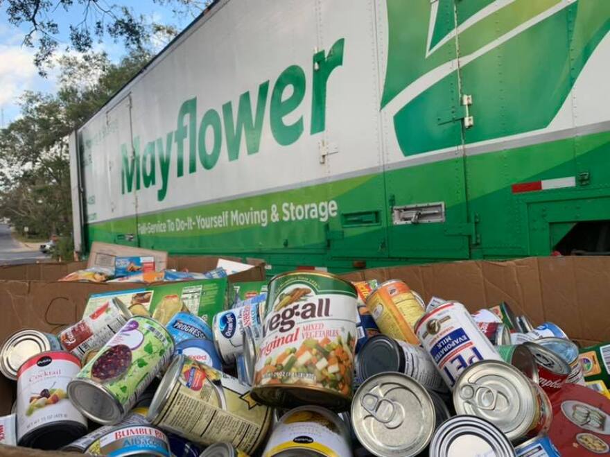 Boxes of canned goods are lined up for the Fill the Mayflower event last November.