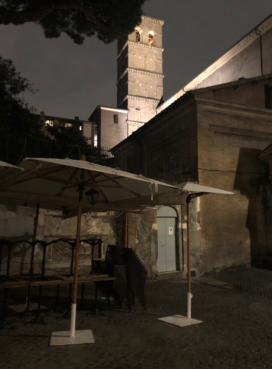 With Roman Catholic Mass banned, the bells of the Basilica di Santa Maria in Trastevere chimed for 10 minutes Saturday at 8 p.m., in a sign of solidarity and prayer for all suffering from the coronavirus.