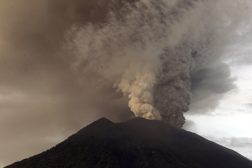 Clouds of ashes rise from the Mount Agung volcano erupting in Karangasem, Indonesia, on Monday.