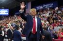 President Donald Trump waves at a campaign rally at Alico Arena on the campus of Florida Gulf Coast University, Friday, Oct. 23, 2026, in Fort Myers, Fla. (AP Photo/Mark Schiefelbein)