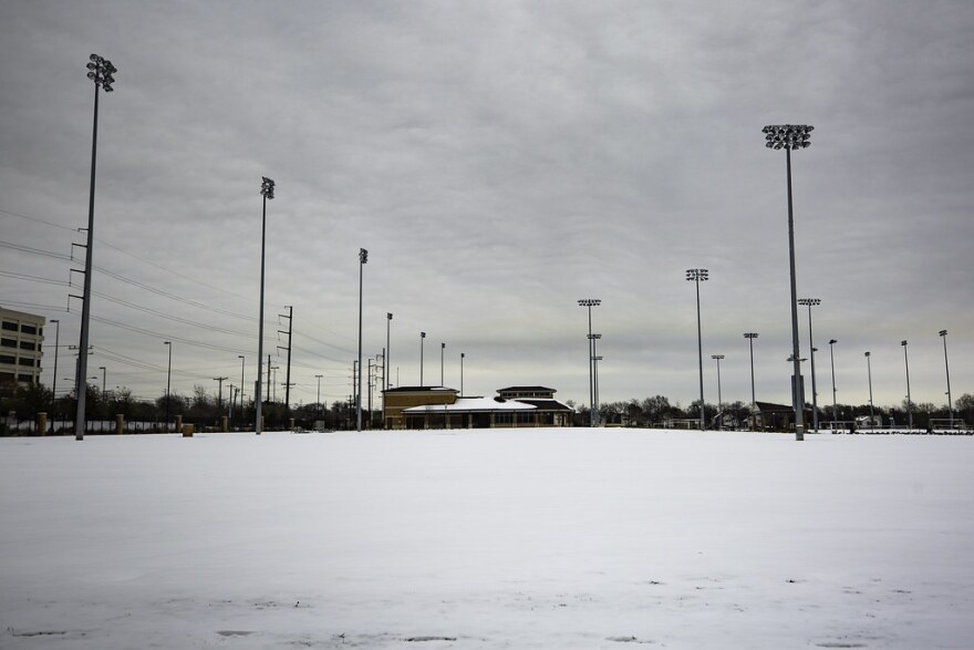 Snowy intramural fields in the North Loop neighborhood of Austin.