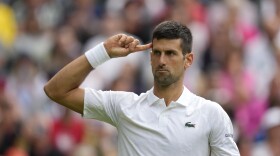 Serbia's Novak Djokovic after winning the second set from Australia's Jordan Thompson during the men's singles match on day three of the Wimbledon tennis championships in London, Wednesday, July 5, 2023. (AP Photo/Alastair Grant)