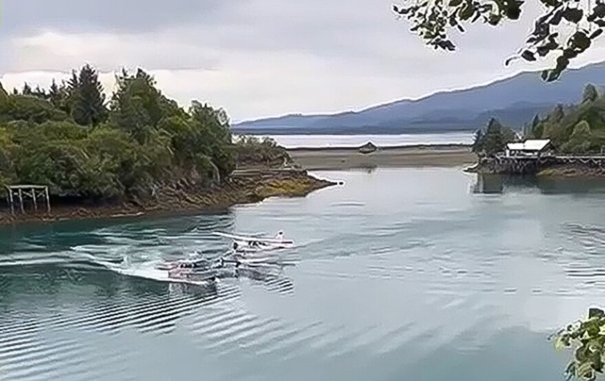 A video from Aug. 23 shows an aluminum boat circling a 1955 de Havilland Beaver as the wake rocks the small aircraft as it tries to leave the cove.