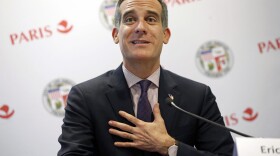In this Oct. 23, 2017 file photo, Los Angeles Mayor Eric Garcetti speaks prior to signing a partnership agreement with his Paris counterpart Anne Hidalgo regarding the Olympic Games in Paris. (Thibault Camus/AP)