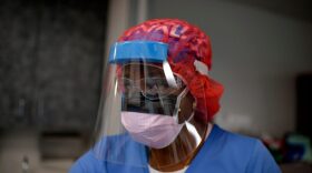 Registered Respiratory Therapist Niticia Mpanga looks through patient information in the ICU at Oakbend Medical Center in Richmond, Texas,  