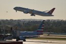 A Turkish Airlines plane takes off alongside an American Airlines plane at Jose Marti International Airport in Havana, Cuba, Monday, Feb. 9, 2026.