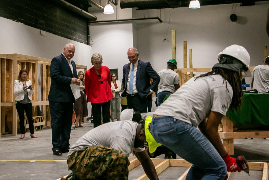 Department of Energy Secretary Jennifer Granholm and Louisiana Gov. John Bel Edwards watch a demonstration by BuildStrong Academy students in Kenner, La. on Wednesday, July 12, 2023.