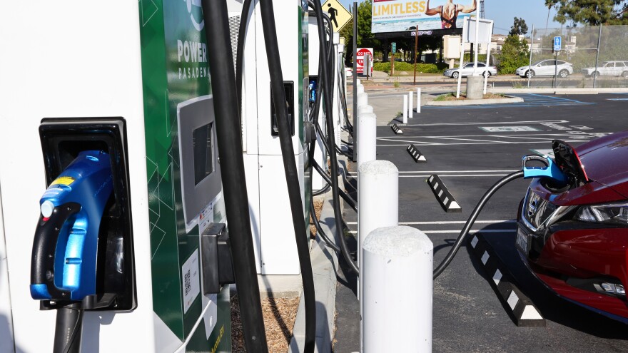 A Nissan electric vehicle recharges at a Power Up fast charger station on April 14, 2022, in Pasadena, Calif. California has more chargers than any other state in the U.S., but the federal government is trying to expand charger access across the country.