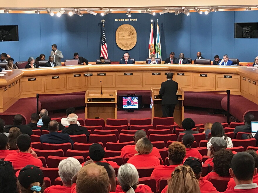 The Miami-Dade County Commission approved a proposal on Tuesday to extend the county's living wage ordinance to concession workers at Miami International Airport.