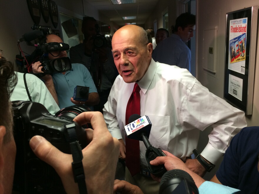 Buddy Cianci faces reporters after announcing his second comeback attempt, in 2014.