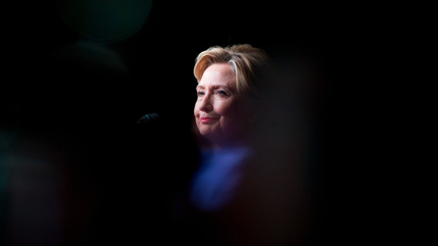 Democratic presidential candidate Hillary Clinton pauses while speaking at a Rainbow PUSH Women's International Luncheon on Monday.