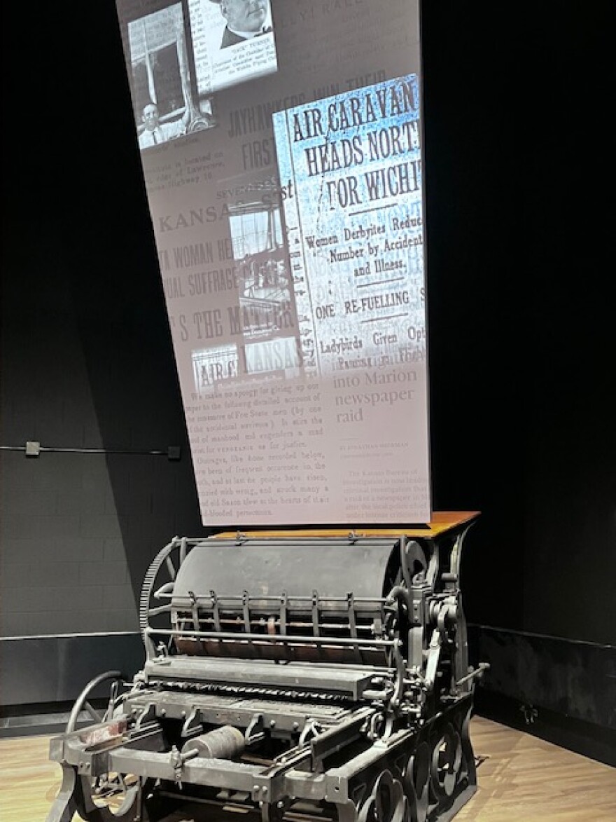 Projected images bring the original printing press from William Allen White’s Emporia Gazette to life in the renovated Kansas Museum of History.