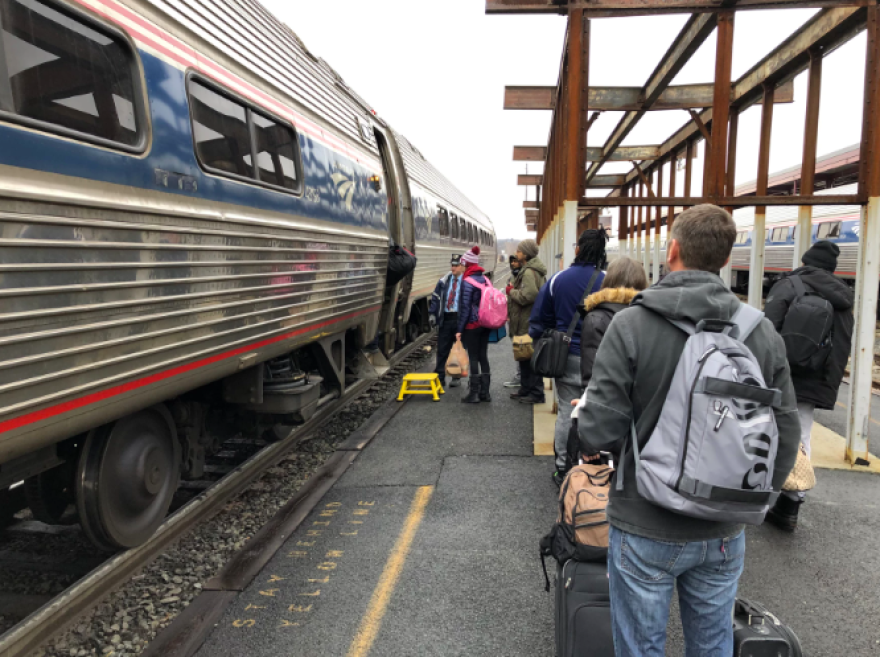 Passengers board Amtrak's Lake Shore Limited after it arrives in Springfield, Massachusetts, on February 10, 2020.