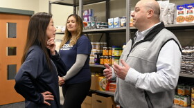 University of Connecticut Waterbury Campus Director Fumiko Hoeft (left) Associated Student Government Vice President Amy Cardova (center), President and CEO of Foodshare Jason Jakubowski, (right) chat after the press conference announcing the new food pantry in Waterbury.
