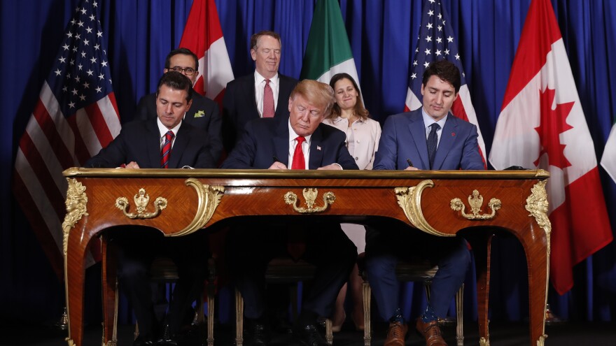 Mexican President Enrique Peña Nieto, Trump and Canadian Prime Minister Justin Trudeau sign the U.S.-Mexico-Canada Agreement — a replacement to NAFTA — Friday at the G-20 summit in Argentina.