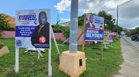 Pictured: Signs at the entrance of Frenchtown on St. Thomas