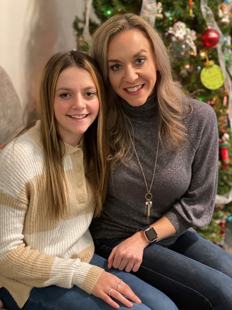  Allie Stout, left, was three years old at the time of the tornado; she keeps a tornado bag with important possessions close at hand. Her mother, Tiffany Stout, says she remembers the feeling of the roof coming off and their house lifting off the ground. “You kind of have an out of body experience,” she says. “I remember hearing this awful screaming. Then I realized it was me screaming.”