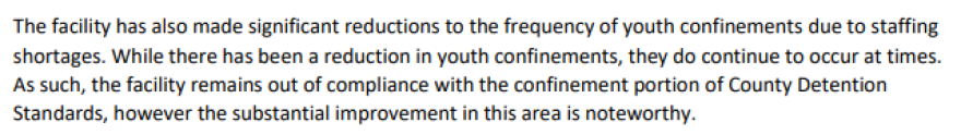 Screenshot of excerpt from Illinois Department of Juvenile Justice's report into the Winnebago County Juvenile Detention Center. It reads: "The facility has also made significant reductions to the frequency of youth confinements due to staffing shortages. While there has been a reduction in youth confinements, they do continue to occur at times. As such, the facility remains out of compliance with the confinement portion of County Detention Standards, however the substantial improvement in this area is noteworthy."