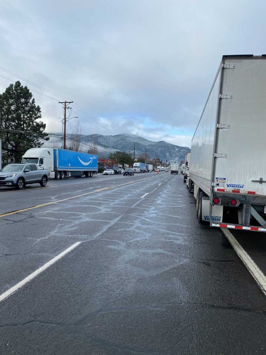 Trucks backed up in Ashland off Exit 11 of I-5 on Thursday, Dec. 16, as the West Coast's main north-south supply route was closed for about 20 hours by snow and ice