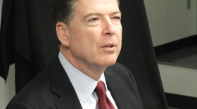 James Comey speaks to the media before his speech