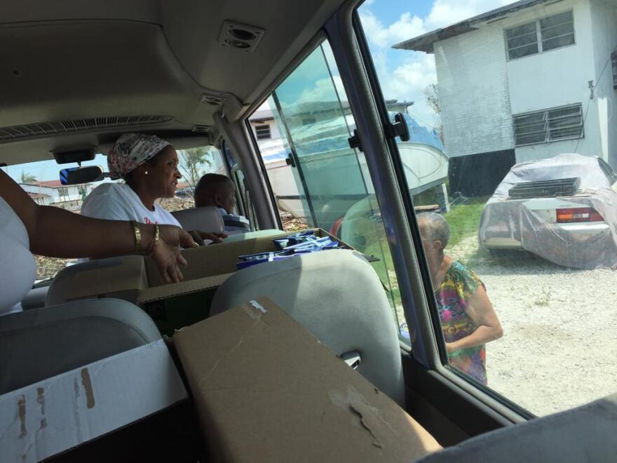Parishioners from a Freeport church distributed food from Royal Caribbean to Bahamians in hard hit neighborhoods on Friday. 