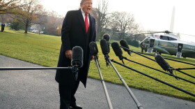President Trump approaches members of the media to speak on former national security adviser Michael Flynn lying to the FBI, prior to his Marine One departure from the South Lawn of the White House on Dec. 4, 2017 in Washington, D.C. (Alex Wong/Getty Images)