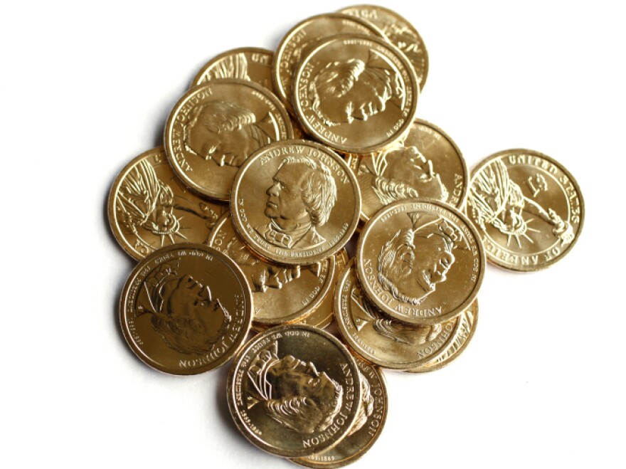 Golden dollar coins featuring Andrew Johnson, the 17th president of the United States.