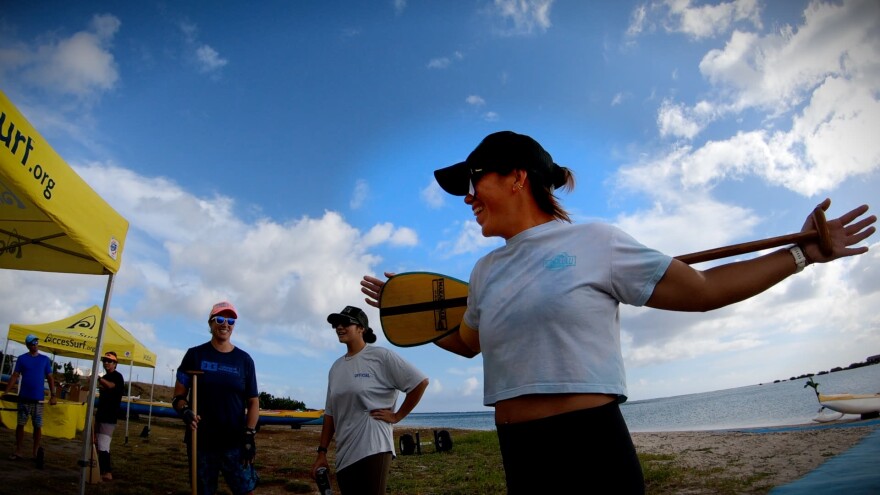 Hawaiian Canoe Club steerswoman Kaulu Luʻuwai (center) takes a breather in between runs during a recent data collection event at Keʻehi Lagoon.