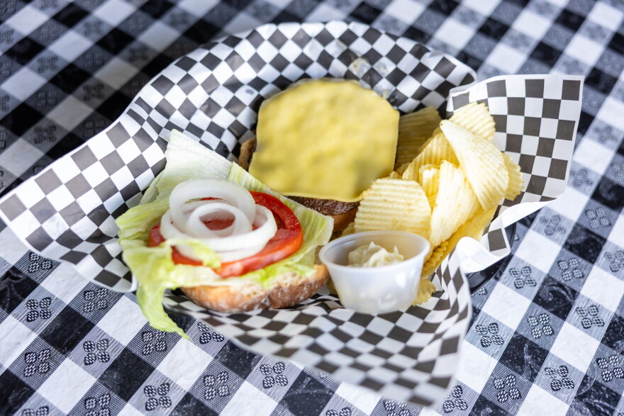 Customers who order an ostrich burger at Papaw's Poole Mill Restaurant can also get in with alpha-gal-friendly cheese on an alpha-gal-friendly burger.