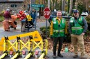CERT volunteers John Bagot and J.D. Jorgensen hold down one of the barricades to keep cars away from the streets where kids were trick-or-treating.