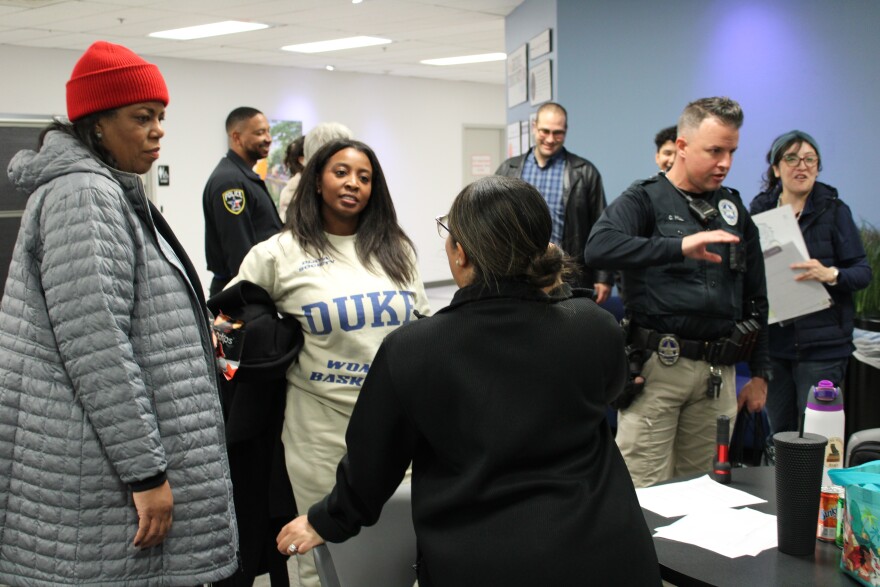 Volunteers and officials debrief at Irving City Hall following the annual Point-in-Time Count.