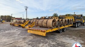 Damaged culvert piping that had been replaced and hauled from Bladen County is dropped off at the Port of Wilmington on Feb. 17, 2022. The pipe will be used to enhance artificial reefs.