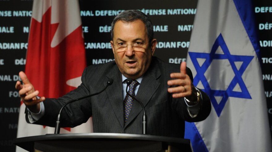 Israel's Minister Defence Ehud Barak responds to a reporter's question as he takes part in a press conference with Canada's Minister of Defence Peter MacKay in Ottawa.