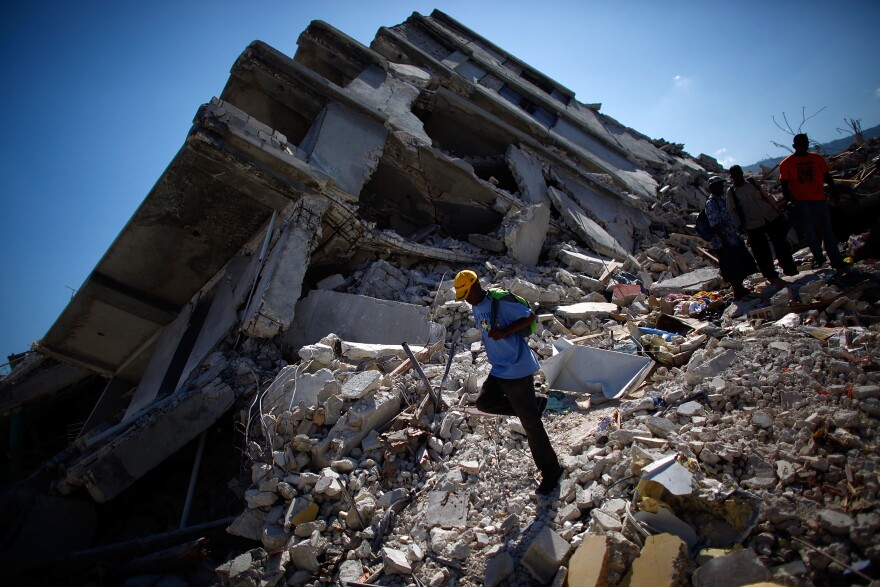 Buildings throughout the capital have been reduced to rubble. A week and a half after the quake, relief supplies are coming in slowly and the main hospital is up and running with the help of foreign doctors.