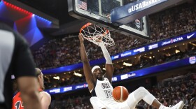 United States center Bam Adebayo (13) dunks during the first half of an exhibition basketball game against Canada, Wednesday, July 10, 2024, in Las Vegas. (AP Photo/Steve Marcus)