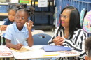 Interim Superintendent Shauna Murphy joins students at Bond Hill Academy in the classroom for the first day of school.
