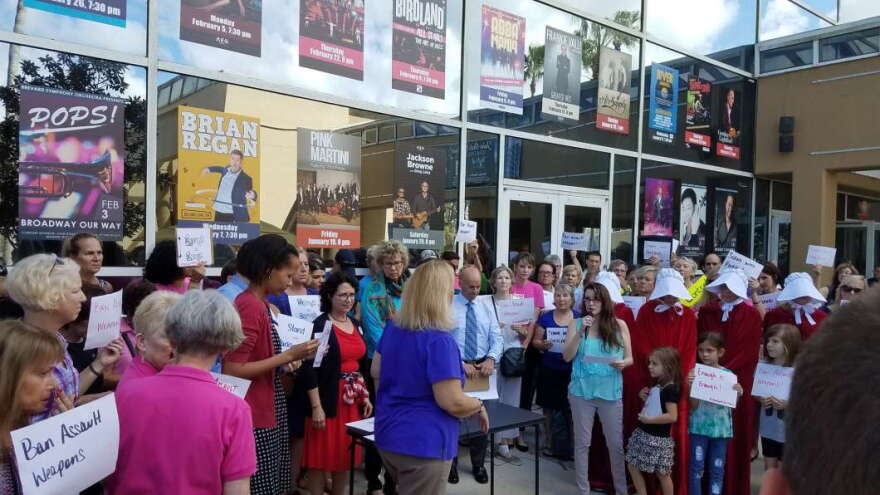 Activist rally outisde a public hearing of the Constitutional Revision Commission calling on an assault weapons ban. Photo: WMFE / Brendan Byrne
