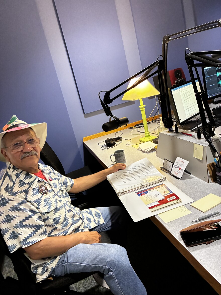 Rene Meave with his lyric sheets at WMUK