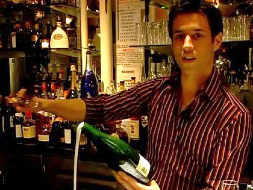 Brice from the Bubble Lounge in New York City demonstrates how to saber a bottle of champagne.