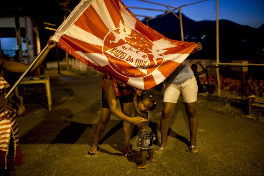 Residents hang out in Salgueiro, where the Salgueiro samba school has a smaller, informal samba group called Raizes Da Tijuca.
