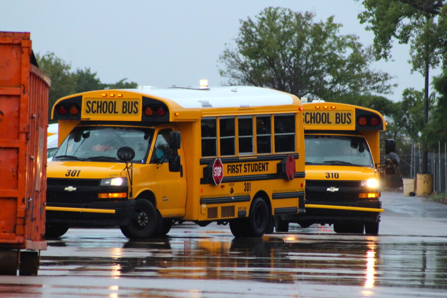 Buses prepare to leave the First Student lot near 29th and West. The district contracts with the company for bus drivers but is still responsible for fueling the buses.