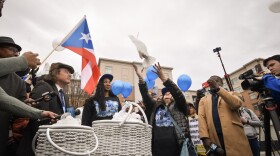Ethan Rivera's mother, Sylvia Rivera, released a dove at a memorial ceremony for her son in uptown Charlotte on Feb. 11, 2023.