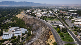 The burn scar from the Canyon Road Fire in Logan. Some nearby residents did not receive evacuation messages from the city's emergency alert system.
