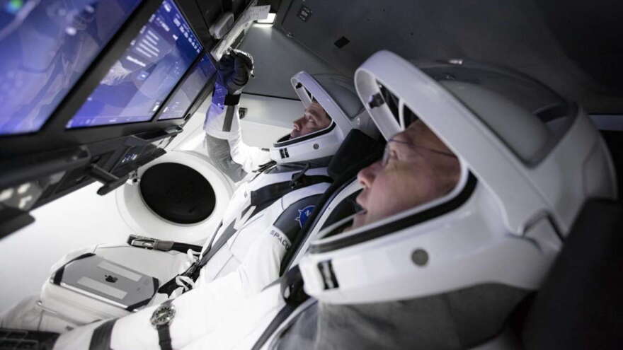 NASA astronauts Bob Behnken and Doug Hurley train on SpaceX's Crew Dragon simulators before their test flight from Kennedy Space Center. Photo: NASA