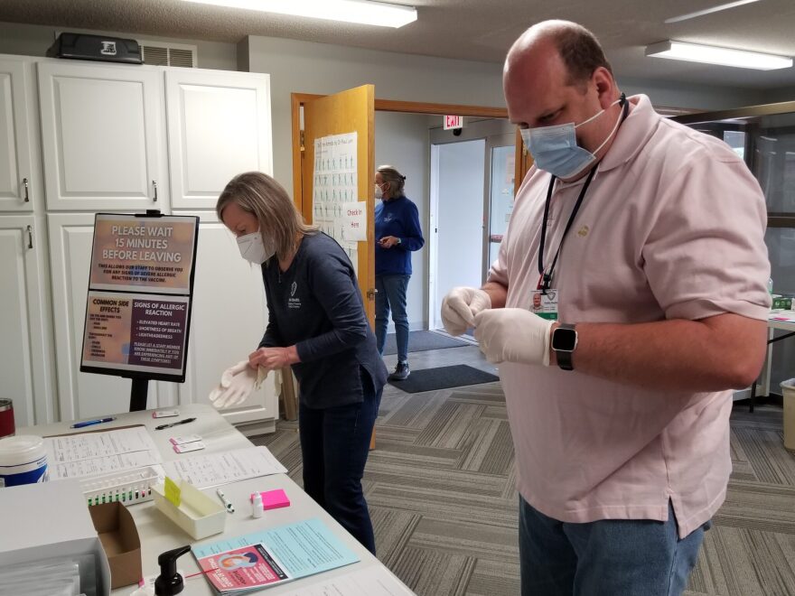 Nurse Anita Perry, left, and Curtis Lanning, emergency coordinator, process samples during a May 2021 drive-up COVID-19 testing event at the Livingston County Health Center in Chillicothe. Livingston County was among the first places in the state to be hit with a surge of Delta variant cases.