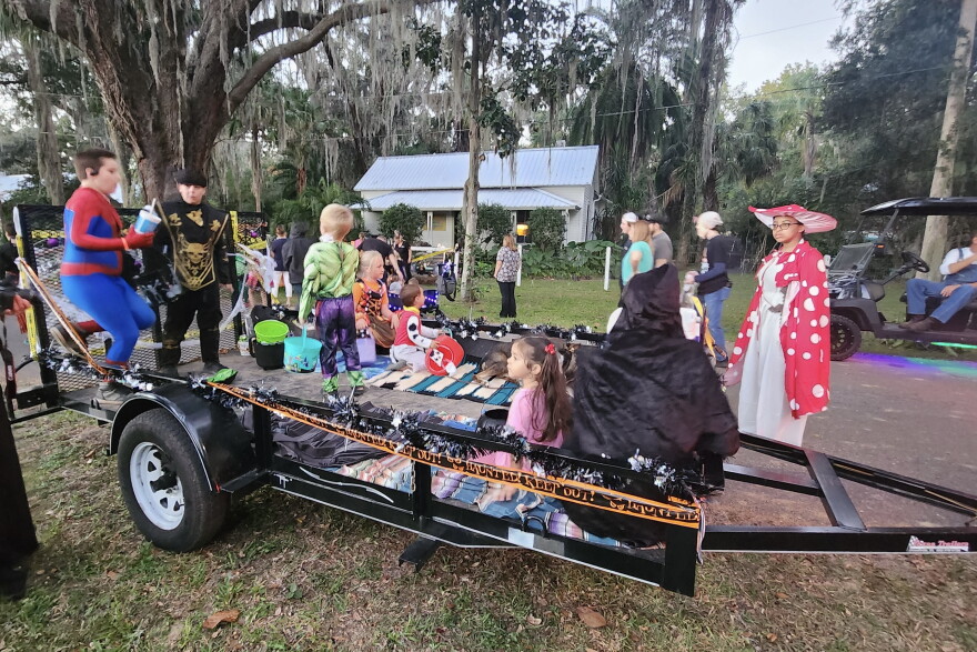 Halloween costumed children pile onto Ashley Culbreth’s trailer, which is decorated differently every year. (Courtesy of Ashley Culbreth)