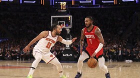 Houston Rockets' Cam Whitmore (7) dribbles the ball against New York Knicks' Jalen Brunson (11) during the first half of an NBA basketball game Monday, Feb. 3, 2025, in New York. (AP Photo/Pamela Smith)
