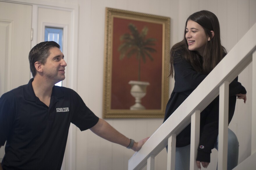 Philip talks with Evelyn before leaving for work. The family moved mostly for Philip's job; he works for a tech company based in the Pacific Northwest.