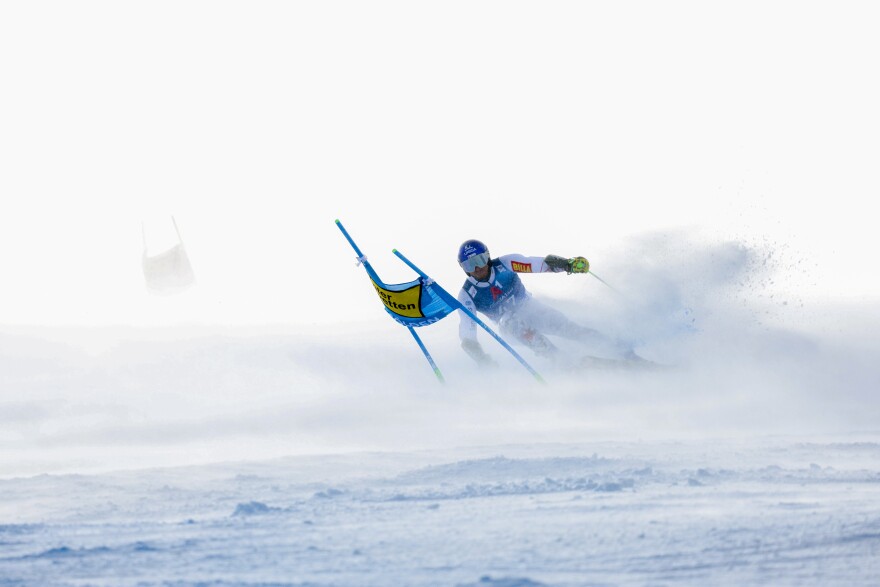 Slovakia's Adam Zampa speeds down the course in strong winds during the first run of an alpine ski, men's World Cup giant slalom race, in Soelden, Austria, Sunday, Oct. 29, 2023. (AP Photo/Alessandro Trovati)